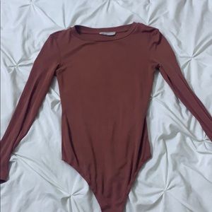 Mauve body suit size extra small